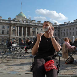 men shave for charity