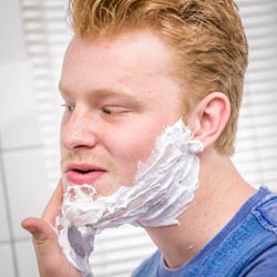 men shave for charity