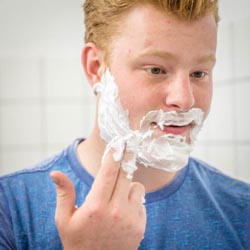 men shave for charity