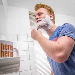 men shave for charity