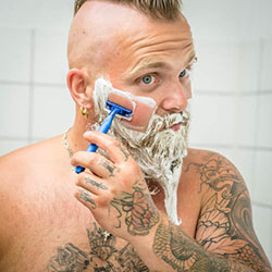 men shave for charity